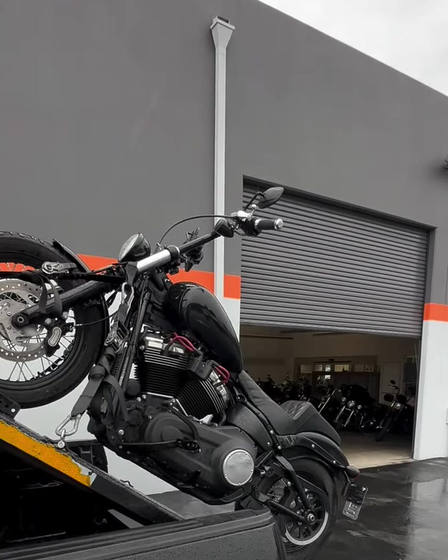 Black cruiser on Law Tigers branded black tow truck lift