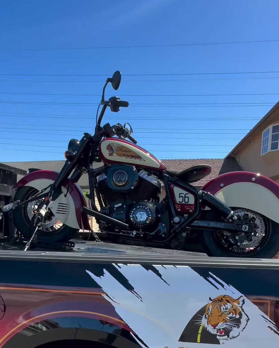 Indian motorcycle number 56 on Law Tigers black truck bed